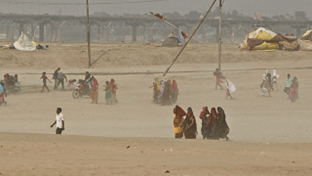 Attribution of 2022 early-spring heatwave in India and Pakistan to climate change: lessons in assessing vulnerability and preparedness in reducing impact